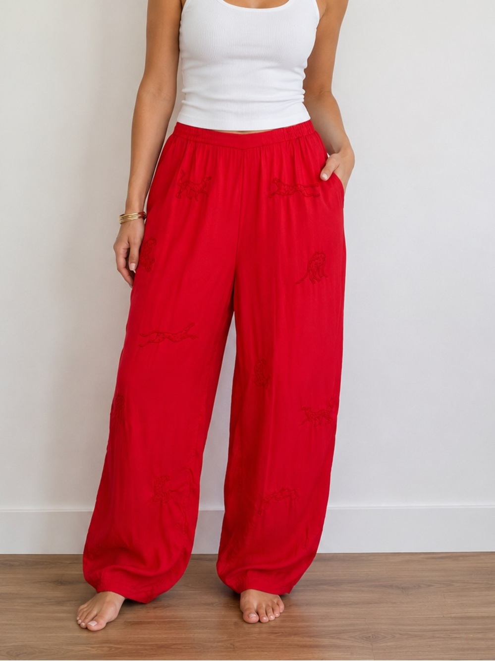 SANI- Small batch clothing from India. Red pants with leopard embroidery